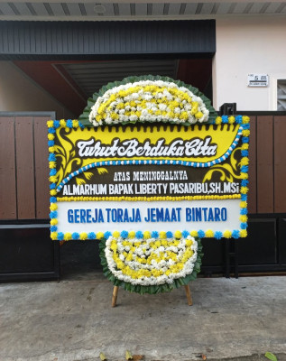 Papan Bunga Duka di Sudimoro